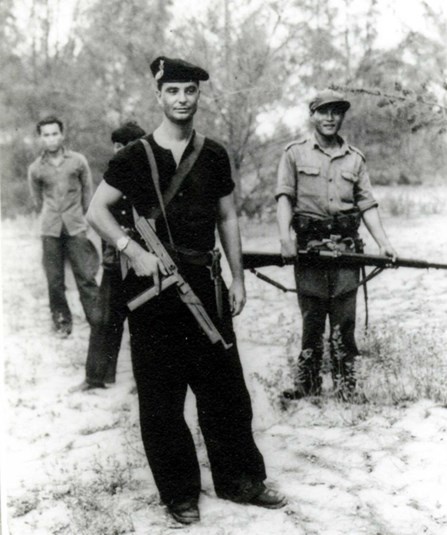 The Thompson stayed in service aboard U.S. Navy vessels for ship-board defense and for use by shore parties. This sailor carries an M1A1 near Quang Tin during 1964.