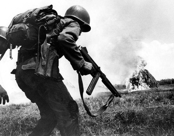 an ARVN trooper with a M1A1 Thompson during an operation against the Viet Cong during 1965.