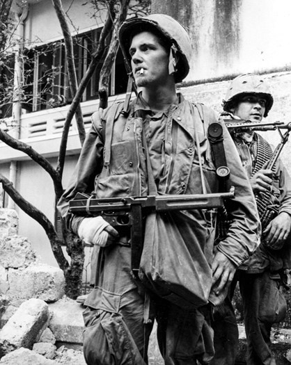 The Thompson was used by Americans during the Vietnam War. This leatherneck of the 1st Marine Division carried a Thompson gun during the Tet Offensive, in the battle for Hue, February 1968.