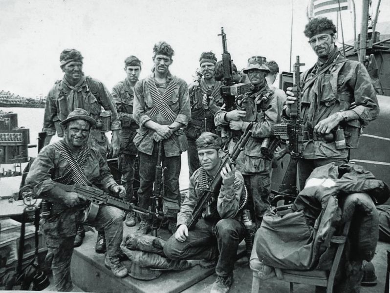 Navy SEALs of Foxtrot Platoon with their weapons, including multiple Stoner 63 rifles. (Photo: US Navy SEAL Museum)