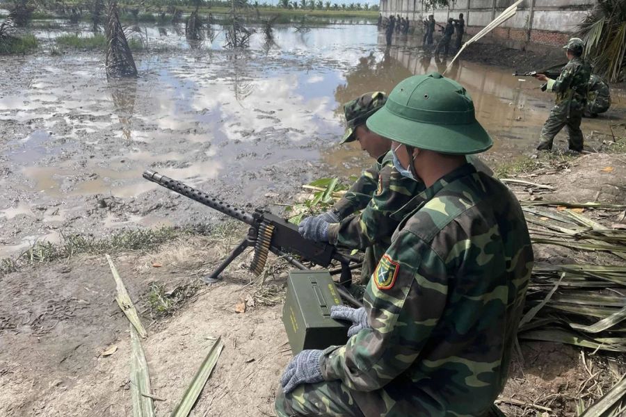 Vietnamese soldier training with a Browning M1919