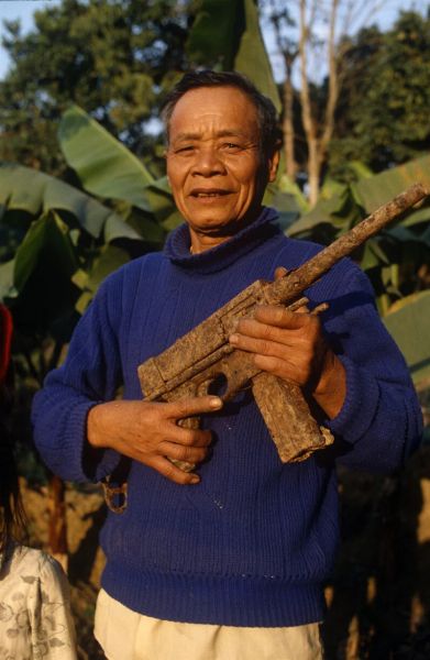 A Vietnamese farmer with a rusted MAT 49 which he found on a rice field in Dien Bien Phu, northern Vietnam, 7 May 2020. (Photo by Thomas Goisque)
