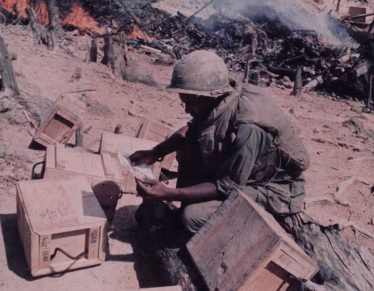 A member of the 2nd Battalion, 506th Infantry, 101st Airborne Division, reads his mail during a break between fire missions at Fire Support Base Ripcord. NARA 111-CCV-284-CC70195
