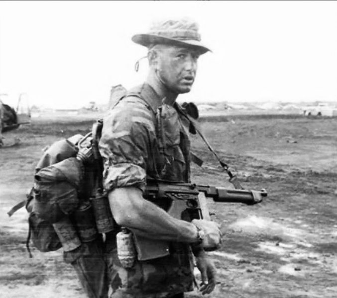 LRRP with Thompson M1A1 modified with a CAR-15 stock.